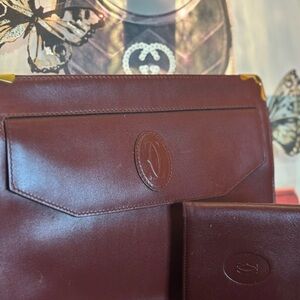 Luxurious Burgundy Leather Cartier pouch and wallet. Pre-loved